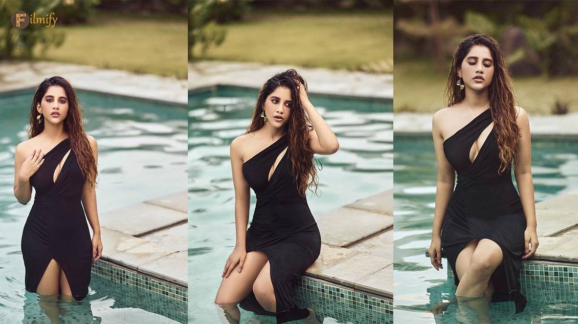 Nabha Natesh flaunts her curves in black dress in pool