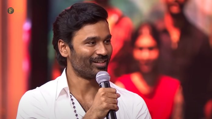 Who is the director who tortured Dhanush in 50 movies?