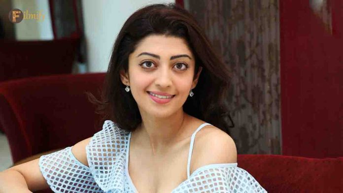 Pranitha Subhash doing yoga with her pet dog