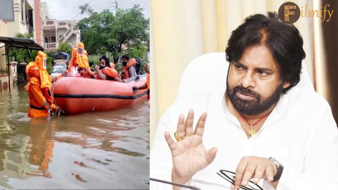 People making shocking comments on Pawan Kalyan who did not visit AP flood areas